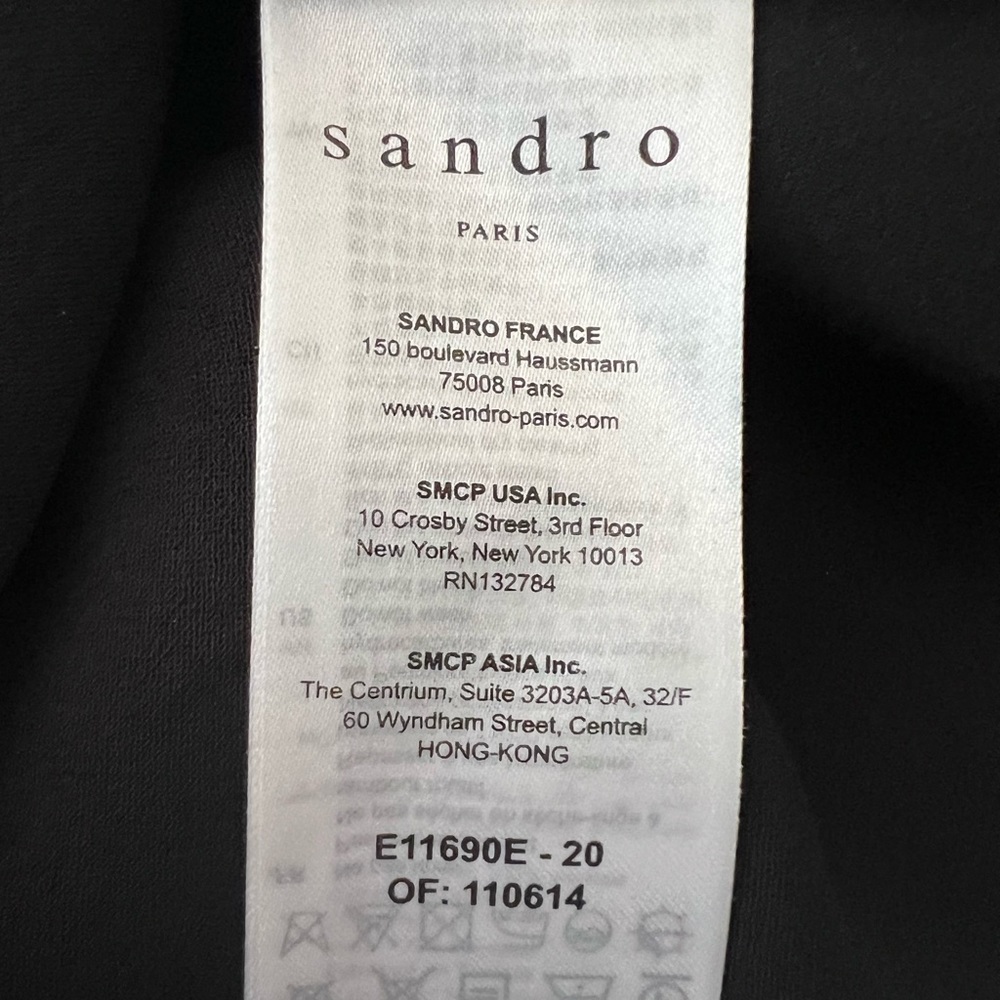 Sandro top, tie at the waist and sleeveless with striped ribbon edging.